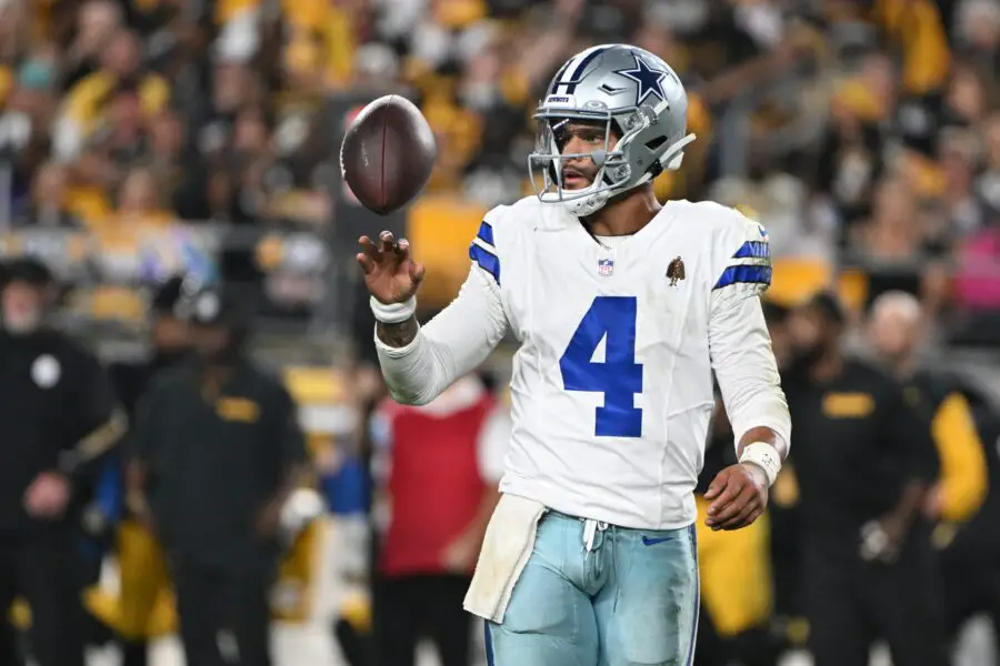 Oct 6, 2024; Pittsburgh, Pennsylvania, USA; Dallas Cowboys quarterback Dak Prescott (4) spins the ball between plays against the Pittsburgh Steelers during the fourth quarter at Acrisure Stadium. Mandatory Credit: Barry Reeger-Imagn Images