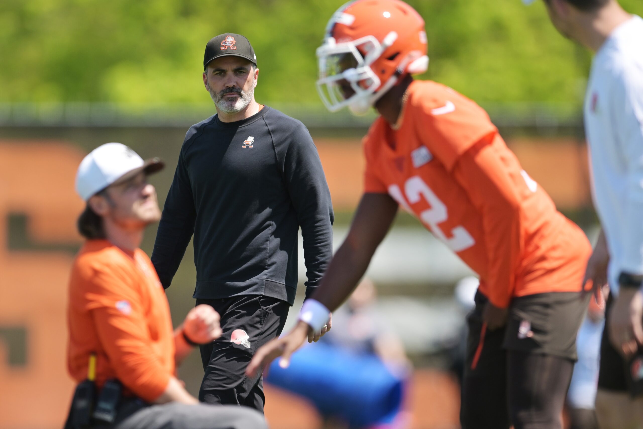 "My Office Is Downstairs" Shedeur Sanders Sees HC Release Huge Statement About Him 1 May 10, 2025; Berea, OH, USA; Cleveland Browns head coach Kevin Stefanski watches quarterback Shedeur Sanders (12) during rookie minicamp at CrossCountry Mortgage Campus. Mandatory Credit: Ken Blaze-Imagn Images