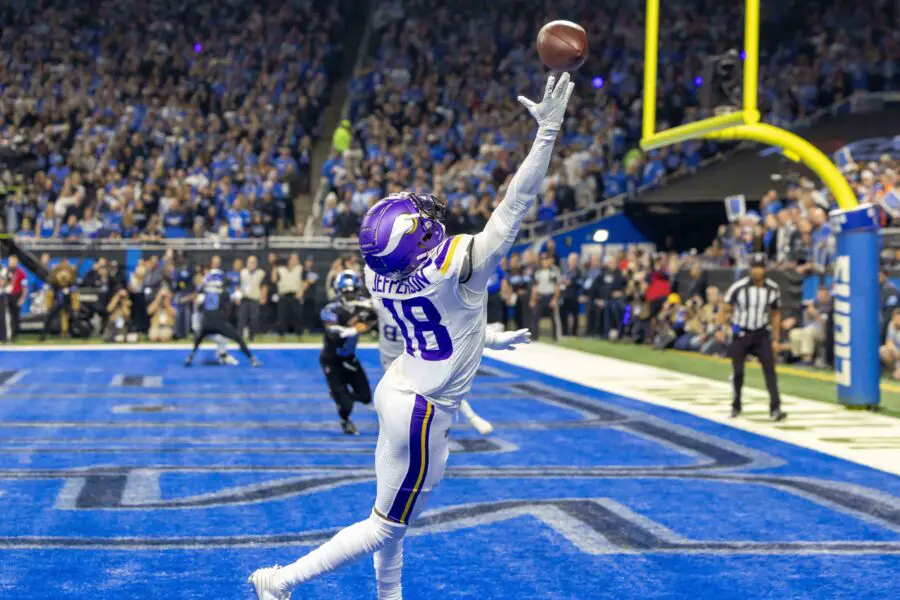 Vikings' Justin Jefferson ignites Timberwolves hype with courtside appearance 3 Minnesota Vikings wide receiver Justin Jefferson (18) attempts to pull in a pass in front of Detroit Lions cornerback Amik Robertson (21) during the first half at Ford Field. Mandatory Credit: David Reginek-Imagn Images