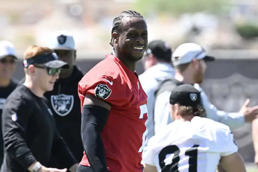 Jun 10, 2025; Henderson, NV, USA; Las Vegas Raiders quarterback Geno Smith (7) looks on during the team stretch during Las Vegas Raiders Minicamp at Intermountain Health Performance Center. Mandatory Credit: Candice Ward-Imagn Images