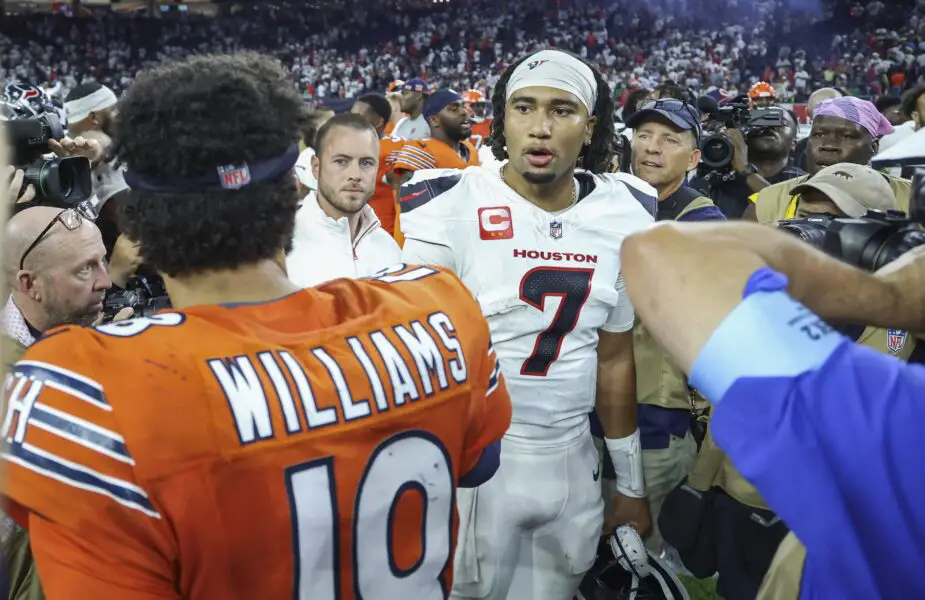 Sep 15, 2024; Houston, Texas, USA; Houston Texans quarterback C.J. Stroud (7) talks with Chicago Bears quarterback Caleb Williams (18) on the field after the game at NRG Stadium. Mandatory Credit: Troy Taormina-Imagn Images