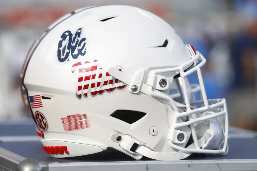 'We Are Devastated': Major College Football Team's Freshman Died Days Before Camp 2 The Mississippi Rebels helmet with the American Flag Ole Miss Script logo on the sideline prior to the game against the Georgia Southern Eagles at Vaught-Hemingway Stadium