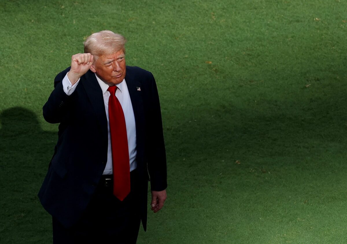 [Subscription Customers Only] Jul 13, 2025; East Rutherford, New Jersey, USA; U.S. President Donald Trump on the pitch during the trophy presentation after the final of the 2025 FIFA Club World Cup at MetLife Stadium. Mandatory Credit: Amanda Perobelli-Reuters via Imagn Images