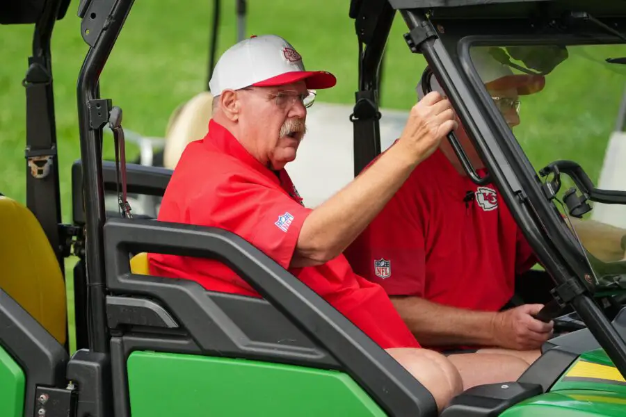 Jul 22, 2025; St. Joseph, MO, USA; Kansas City Chiefs head coach Andy Reid rides a cart down the hill to the fields prior to training camp at Missouri Western State University. Mandatory Credit: Denny Medley-Imagn Images