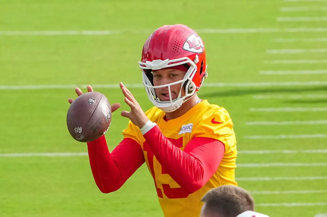 Jul 22, 2025; St. Joseph, MO, USA; Kansas City Chiefs quarterback Patrick Mahomes (15) receives a snap during training camp at Missouri Western State University. Mandatory Credit: Denny Medley-Imagn Images