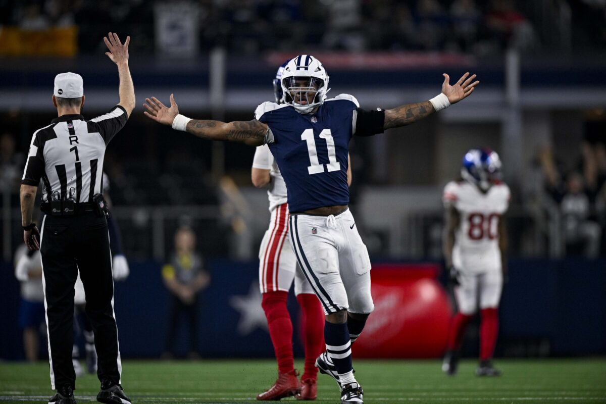 Nov 24, 2022; Arlington, Texas, USA; Dallas Cowboys linebacker Micah Parsons (11) celebrates after he sacks New York Giants quarterback Daniel Jones (8) during the second half of the game between the Cowboys and the Giants at AT&T Stadium. Mandatory Credit: Jerome Miron-Imagn Images