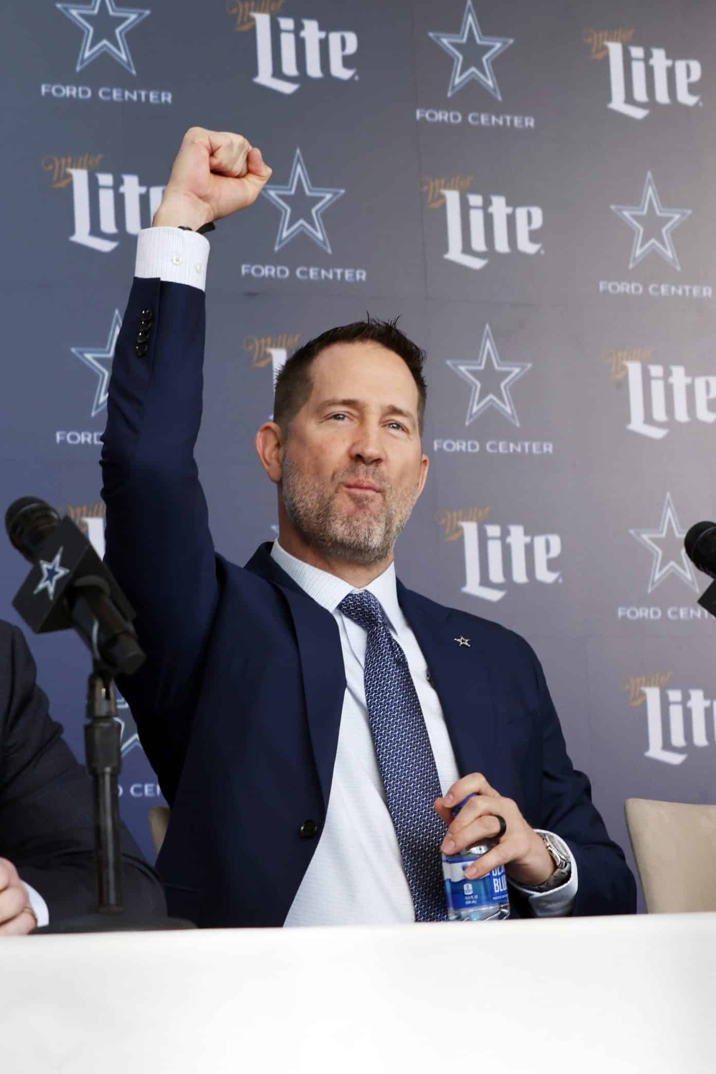 Jan 27, 2025; Frisco, TX, USA;   Dallas Cowboys Head Coach Brian Schottenheimer reacts while speaking to the media at a press conference at the Star.  Mandatory Credit: Tim Heitman-Imagn Images