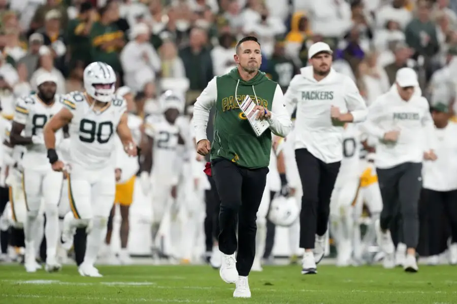 Sep 11, 2025; Green Bay, Wisconsin, USA; Green Bay Packers head coach Matt LaFleur leaves the field at halftime against the Washington Commanders at Lambeau Field. Mandatory Credit: Jeff Hanisch-Imagn Images
