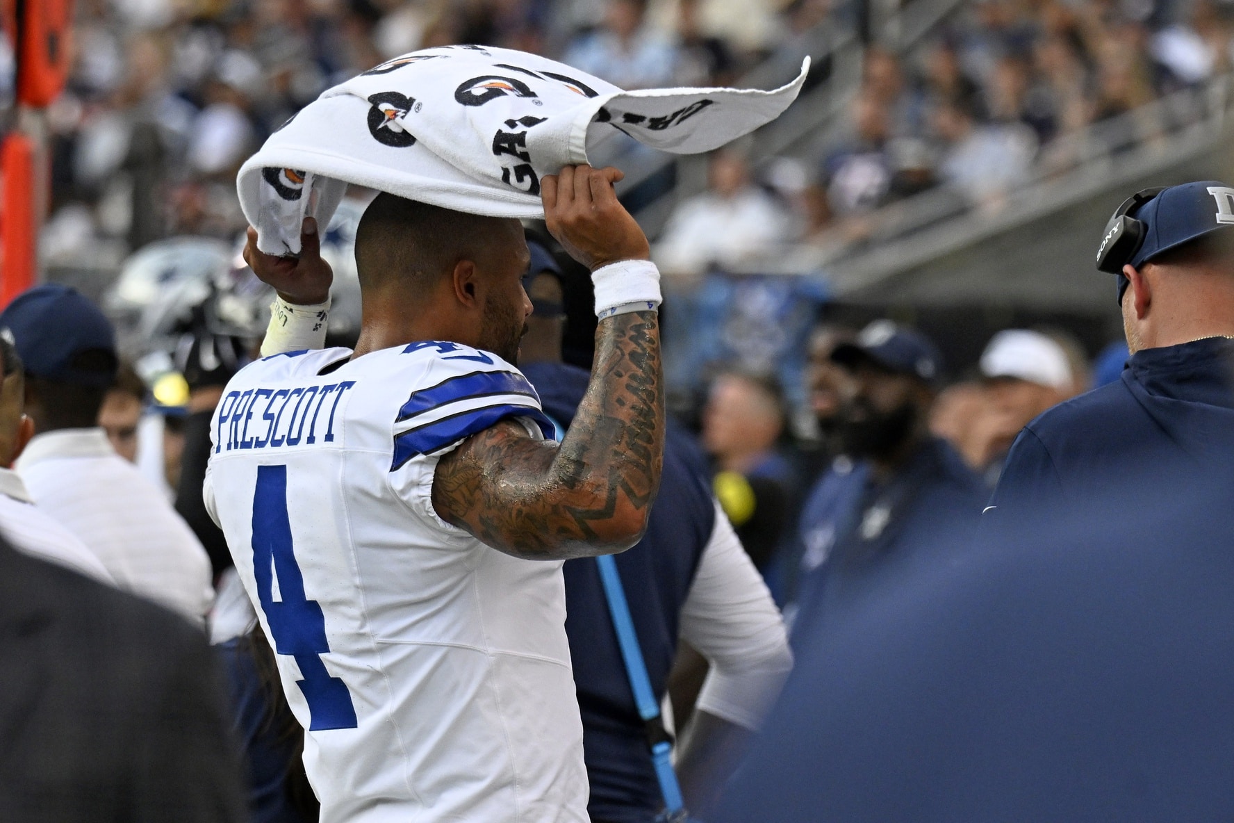 Sep 21, 2025; Chicago, Illinois, USA; Dallas Cowboys quarterback Dak Prescott (4) reacts on the bench against the Chicago Bears during the second half at Soldier Field. Mandatory Credit: Matt Marton-Imagn Images