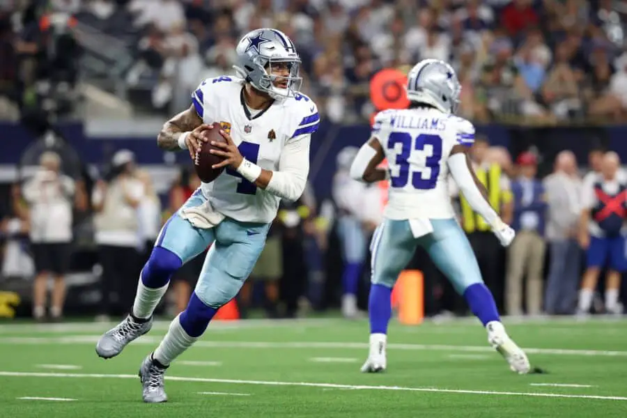 Sep 28, 2025; Arlington, Texas, USA; Dallas Cowboys quarterback Dak Prescott (4) looks to pass against the Green Bay Packers in the first quarter at AT&T Stadium. Mandatory Credit: Kevin Jairaj-Imagn Images