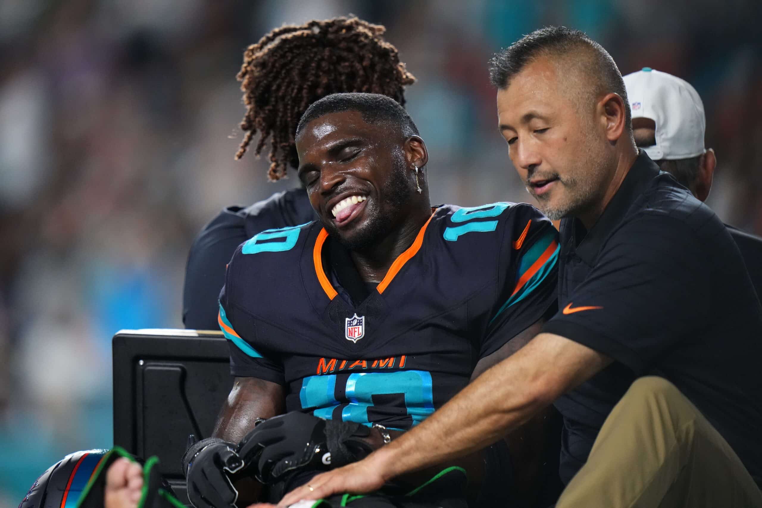 Smiling On The Cart": Miami Dolphins Fans Believe Tyreek Hill Was Happy  With Injury Not Having To Play With Tua Tagavailoa - Gridiron Heroics