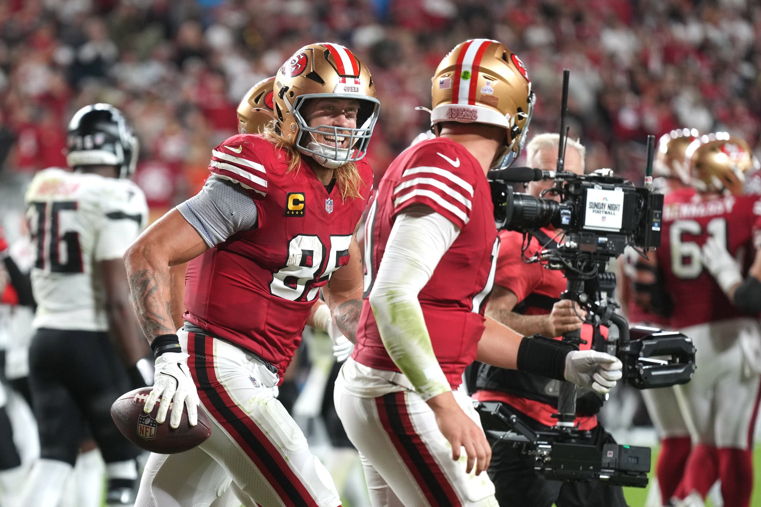 "He's Not Going To Suit Up" 49ers Face Sudden Loss Hours Before Kickoff Vs Texans 3 Oct 19, 2025; Santa Clara, California, USA; San Francisco 49ers tight end George Kittle (center left) celebrates with quarterback Mac Jones (center right) after a touchdown by running back Christian McCaffrey (not pictured) during the fourth quarter against the Atlanta Falcons at Levi's Stadium. Mandatory Credit: Darren Yamashita-Imagn Images