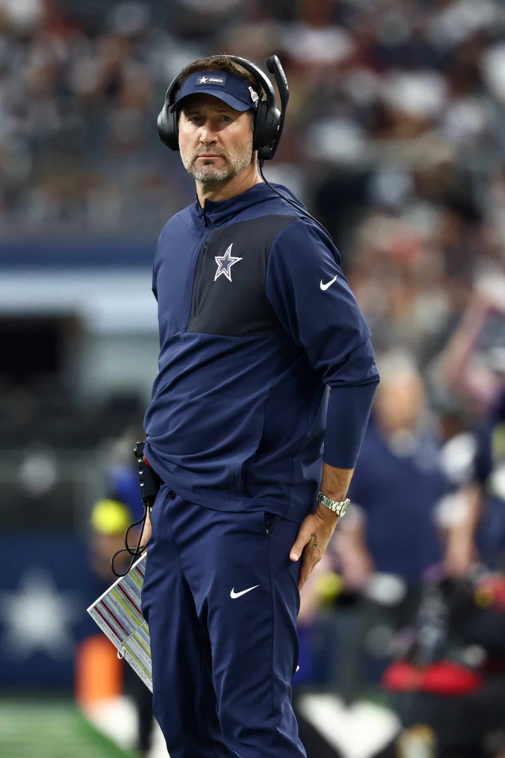 Oct 19, 2025; Arlington, Texas, USA; Dallas Cowboys head coach Brian Schottenheimer looks on prior to the game against the Washington Commanders at AT&T Stadium. Mandatory Credit: Kevin Jairaj-Imagn Images
