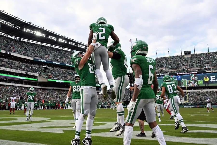 Oct 26, 2025; Philadelphia, Pennsylvania, USA; Philadelphia Eagles wide receiver Jahan Dotson (2) celebrates with teammates after scoring a touchdown against the New York Giants in the fourth quarter at Lincoln Financial Field. Mandatory Credit: Eric Hartline-Imagn Images
