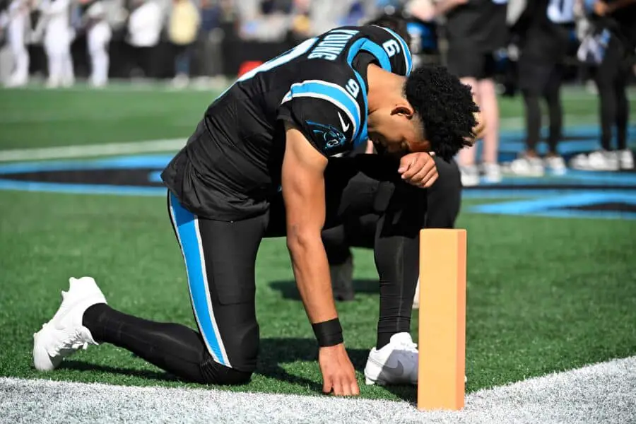 Nov 9, 2025; Charlotte, North Carolina, USA; Carolina Panthers quarterback Bryce Young (9) reflects before the game at Bank of America Stadium. Mandatory Credit: Bob Donnan-Imagn Images