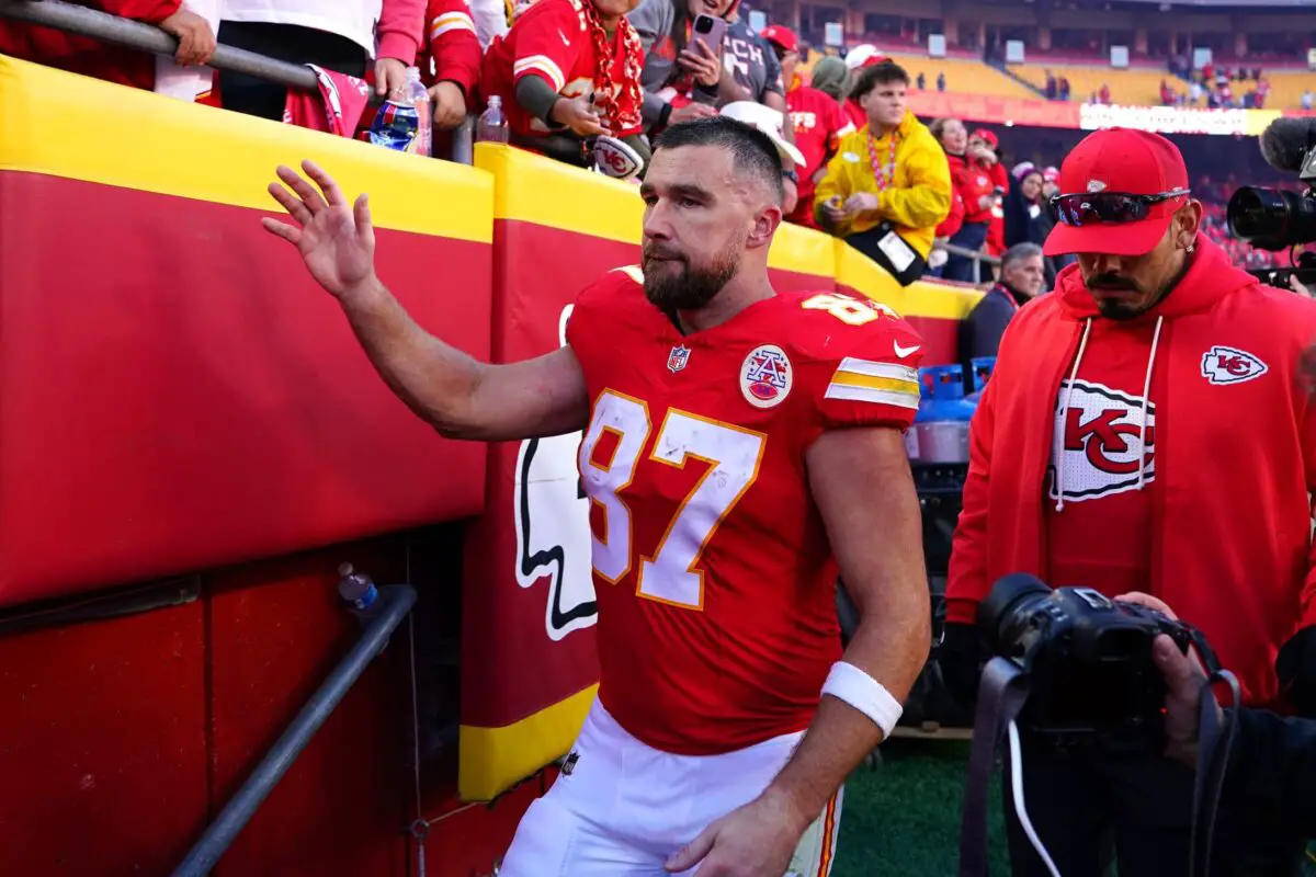 Nov 23, 2025; Kansas City, Missouri, USA; Kansas City Chiefs tight end Travis Kelce (87) greets fans after the game against the Indianapolis Colts at GEHA Field at Arrowhead Stadium. Mandatory Credit: Denny Medley-Imagn Images
