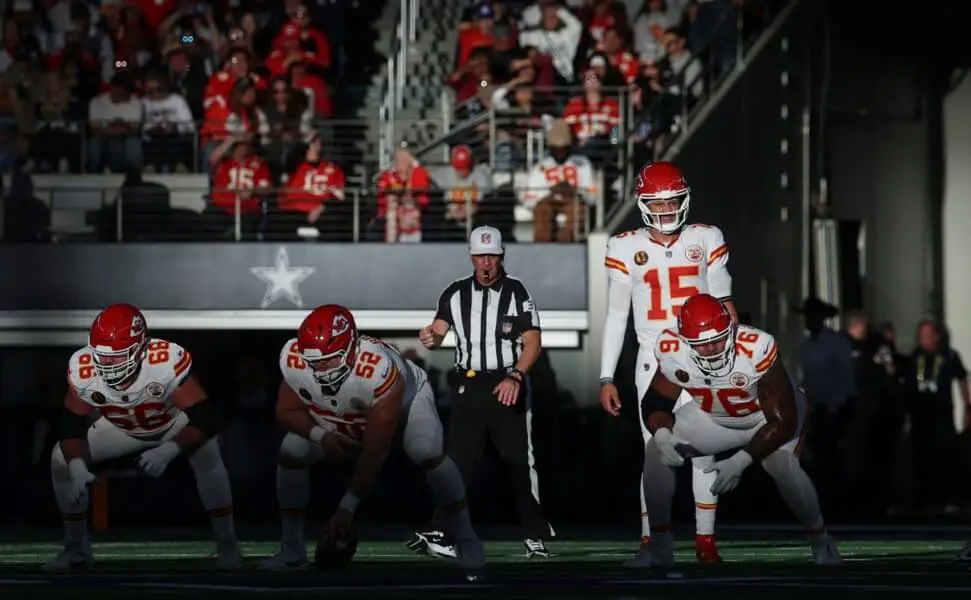 Nov 27, 2025; Arlington, Texas, USA; Kansas City Chiefs quarterback Patrick Mahomes (15) waits for the snap against the Dallas Cowboys during the second quarter at AT&T Stadium. Mandatory Credit: Kevin Jairaj-Imagn Images