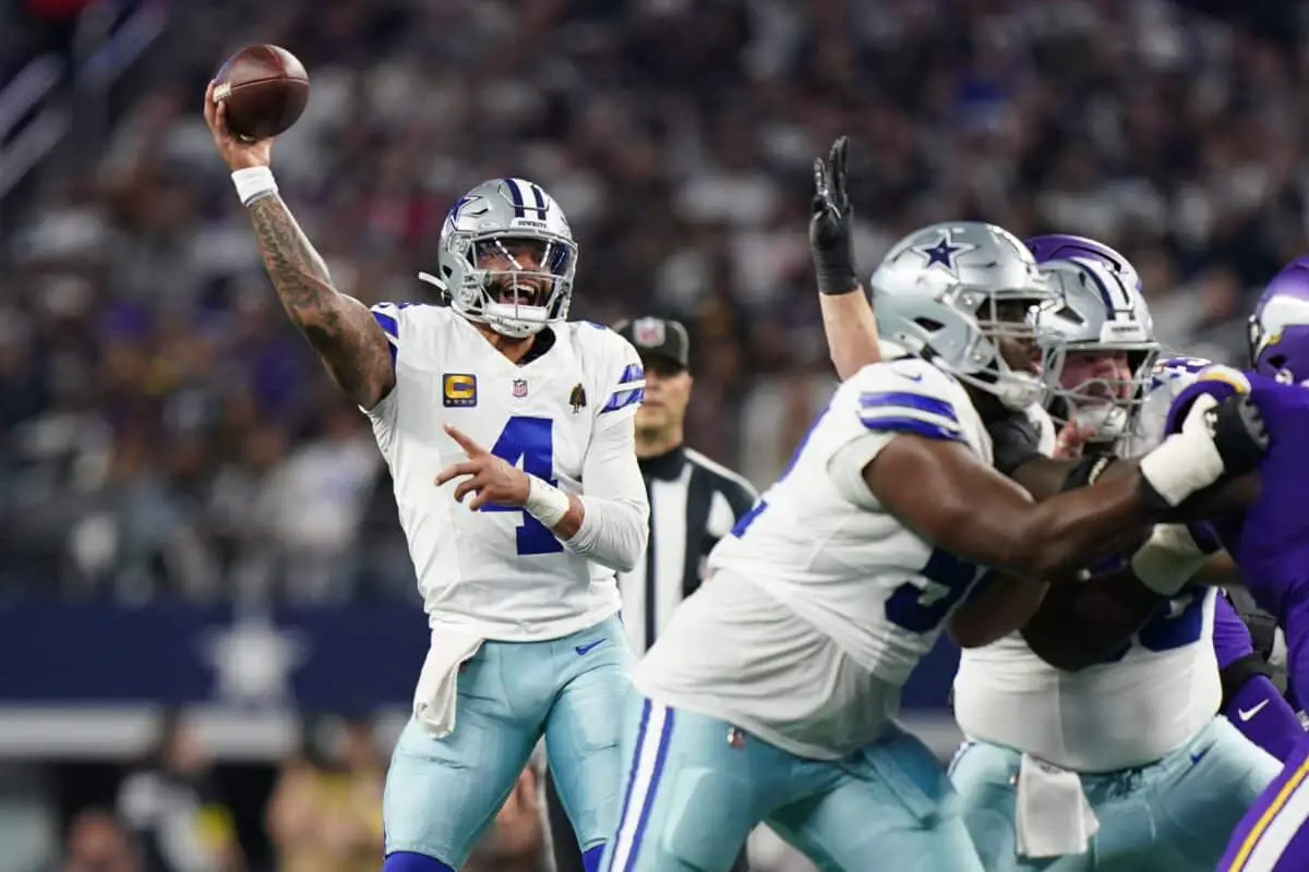 Dec 14, 2025; Arlington, Texas, USA; Dallas Cowboys quarterback Dak Prescott (4) throws during the second half against the Minnesota Vikings at AT&T Stadium. Mandatory Credit: Raymond Carlin III-Imagn Images